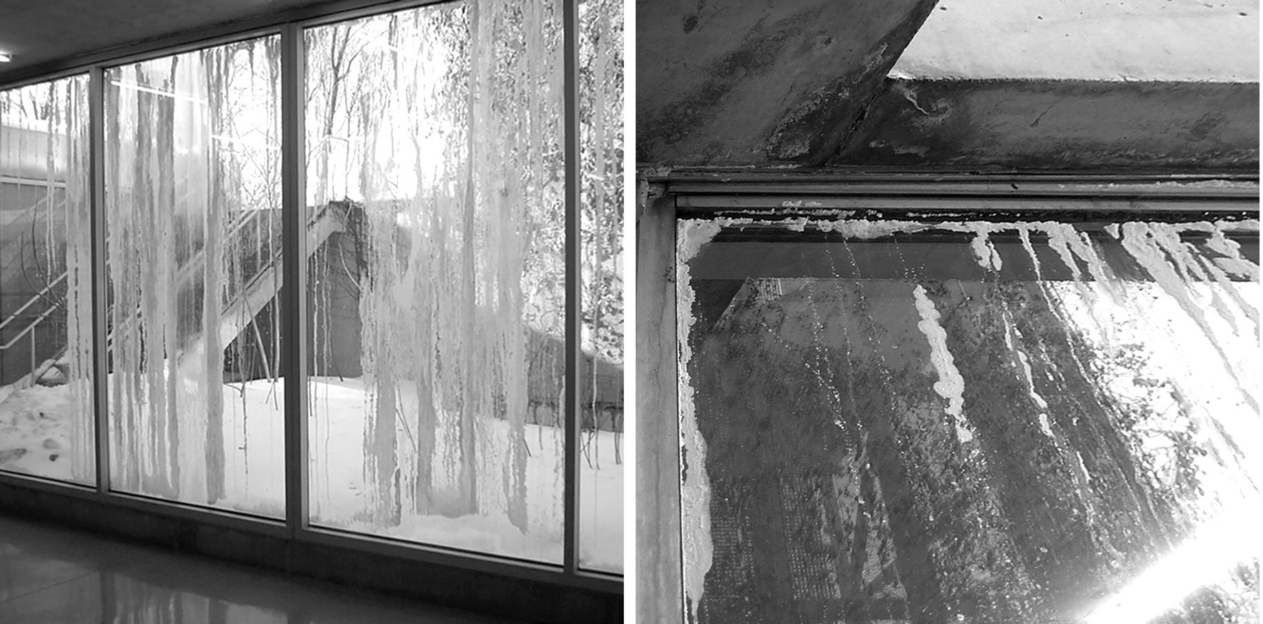 Gallery curtain wall viewed from inside covered with white efflorescence stains.