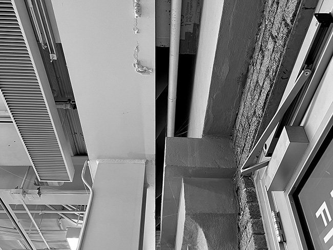 Looking up at underside of seismic joint between Milstein and Rand Halls.
