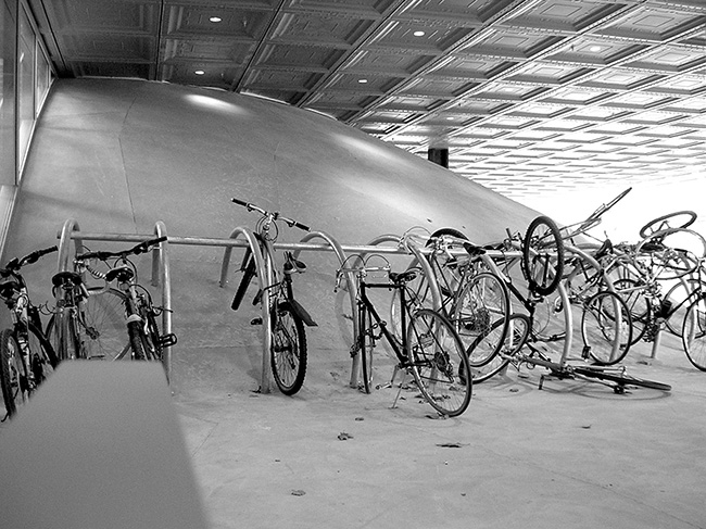 Concrete dome with bike racks.