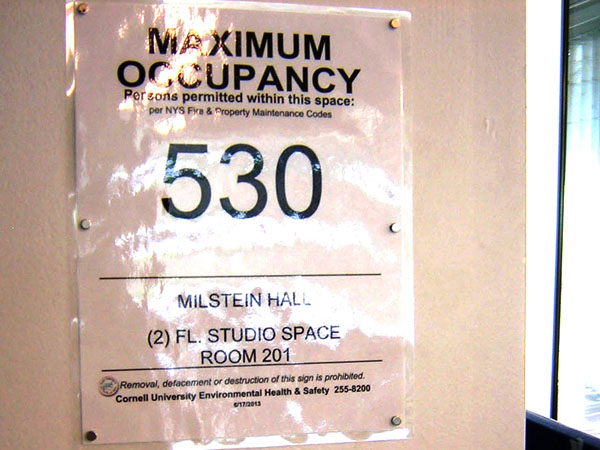posted occupancy sign in Milstein Hall, upper level